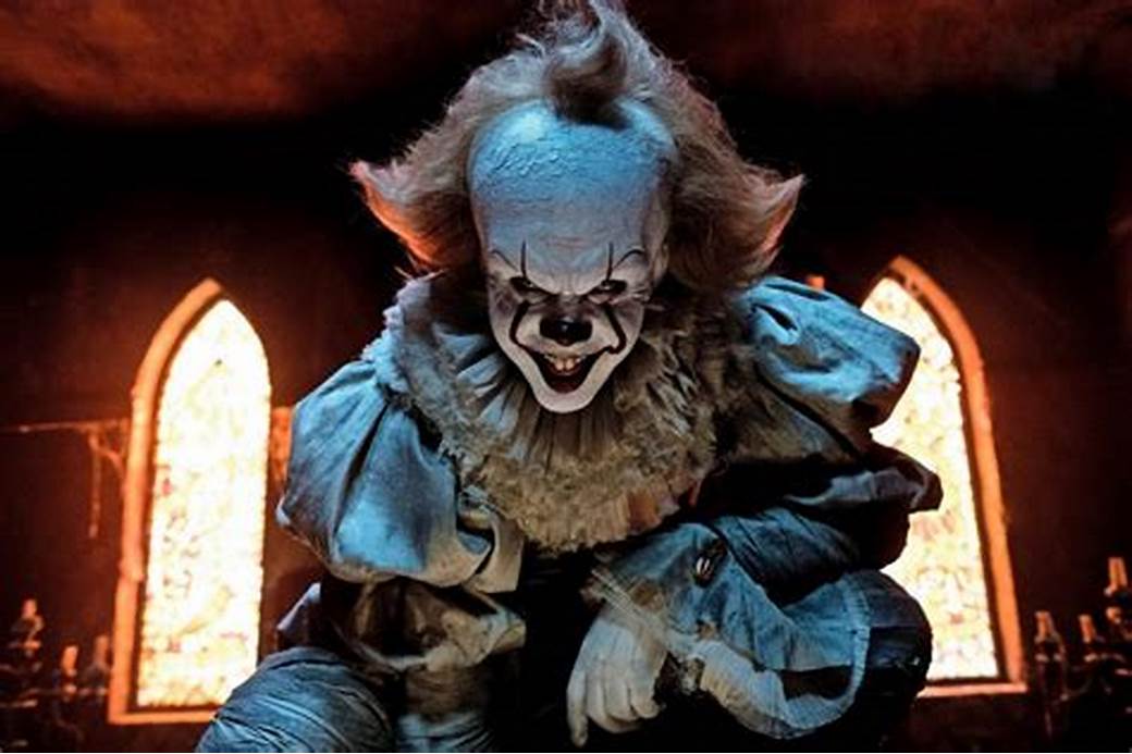What item does Pennywise the clown famously carry in the movie "IT"