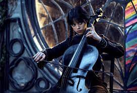What song does Wednesday play on the cello?