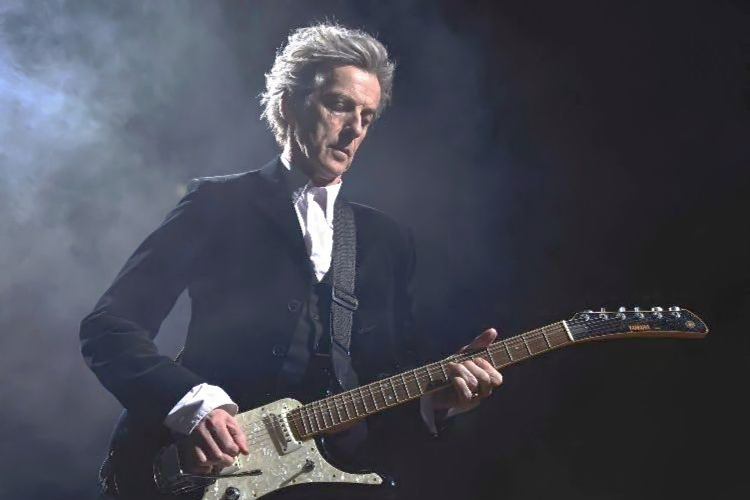 What song did The Twelfth Doctor not play on his guitar?
