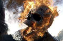 At the end of Ghost Rider Spirit of Vengeance, what colour is Ghost Rider's flame at the end of the movie?